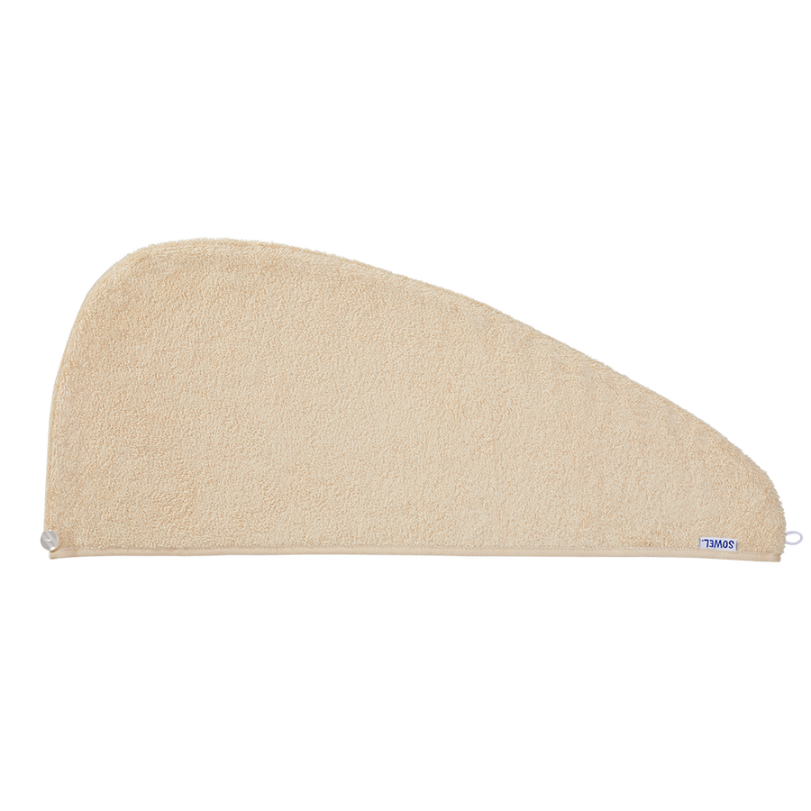 Haarturban mit Knopf aus Bio-Baumwolle in Sand – flach liegend
